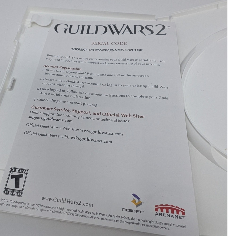 Guild Wars 2 PC Game DVD-ROM ArenaNet 2-Disc Set with Manual and Serial Code - Picture 11 of 11